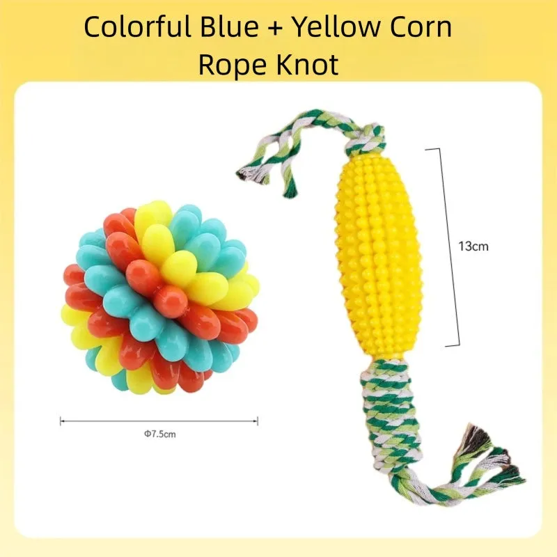 Multicolour durable rubber dog teething ball in red yellow and teal for dental cleaning and interactive play