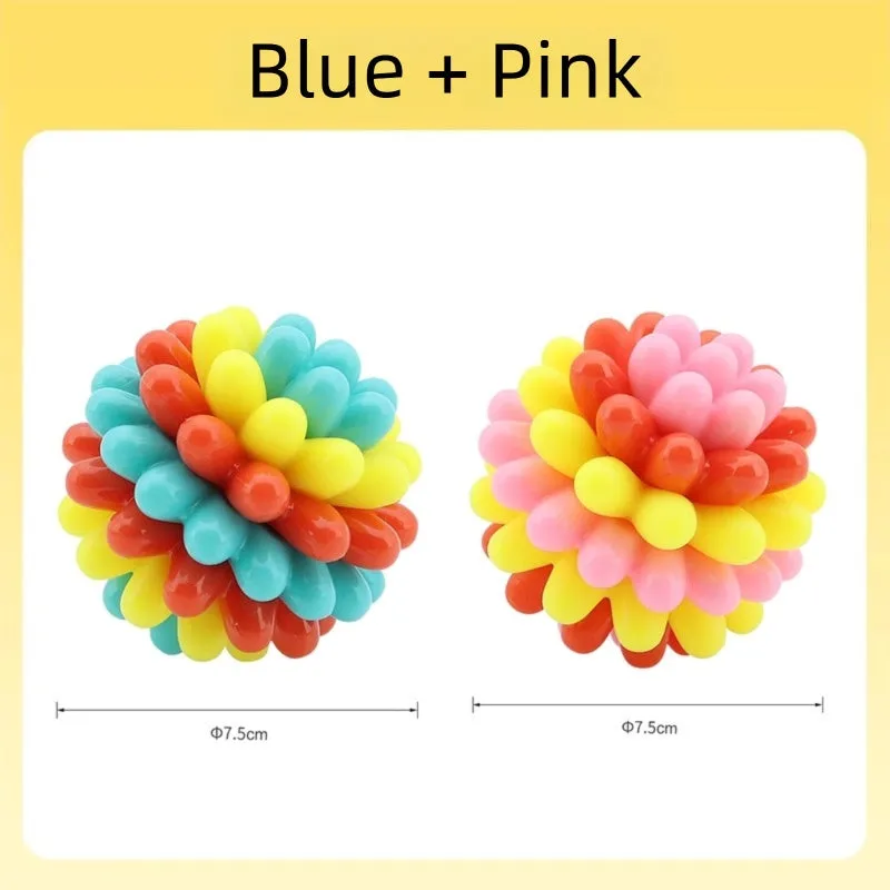Multicolour durable rubber dog teething ball in red yellow and teal for dental cleaning and interactive play