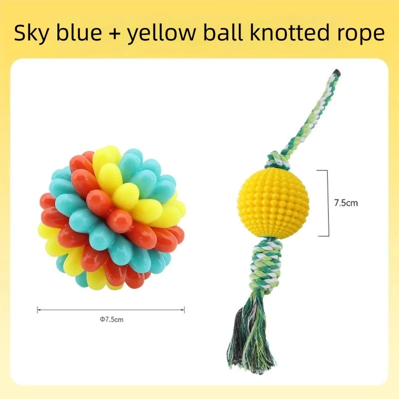 Multicolour durable rubber dog teething ball in red yellow and teal for dental cleaning and interactive play