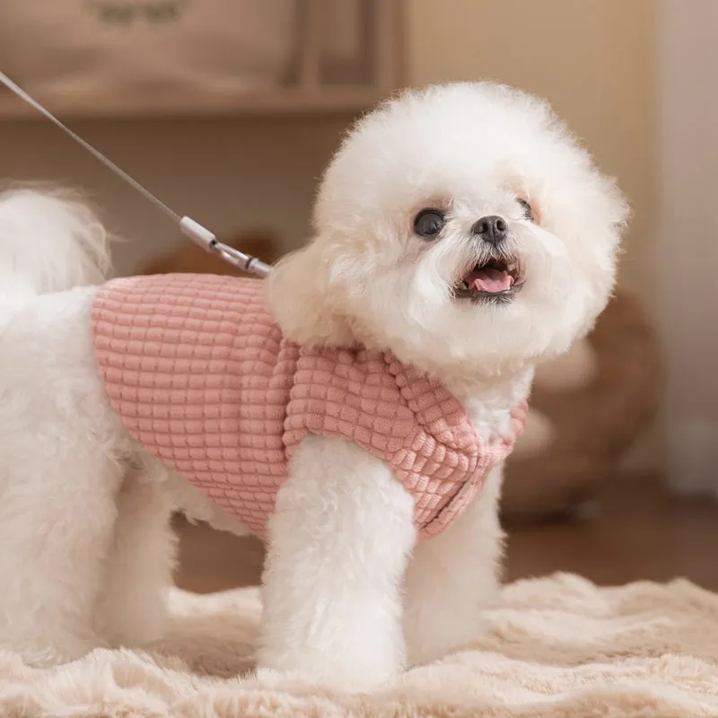 Pink corduroy dog vest with metal leash ring, cotton lining, and bear emblem tag, for small and medium dogs