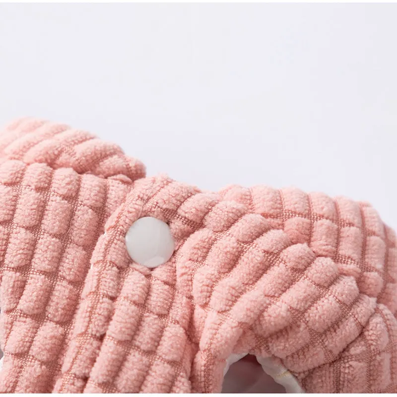 Pink corduroy dog vest with metal leash ring, cotton lining, and bear emblem tag, for small and medium dogs