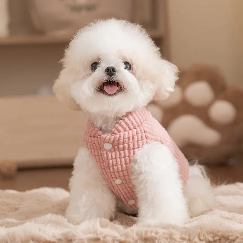 Pink corduroy dog vest with metal leash ring, cotton lining, and bear emblem tag, for small and medium dogs