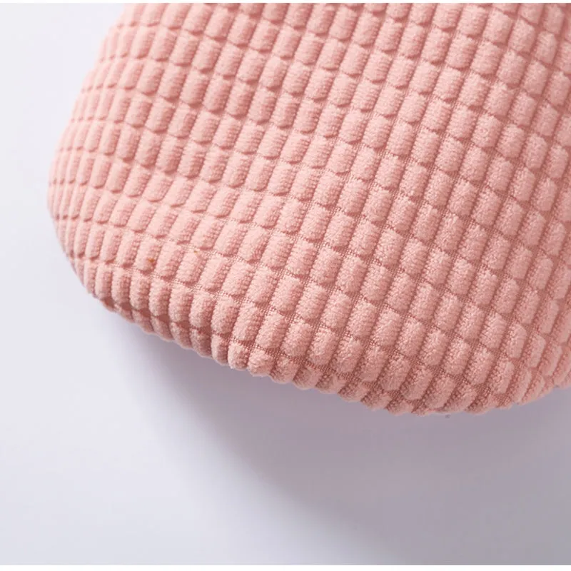 Pink corduroy dog vest with metal leash ring, cotton lining, and bear emblem tag, for small and medium dogs