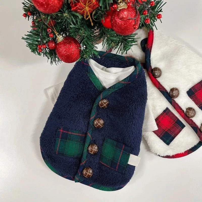 Red and navy blue checkered pet fleece jacket with Sherpa lining and snowman accent on a small dog