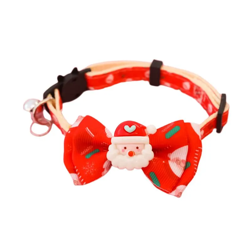 Christmas pet collar with bow tie, bell, and adjustable strap featuring Santa Claus and tree patterns