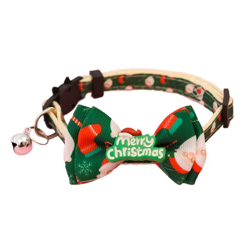 Christmas pet collar with bow tie, bell, and adjustable strap featuring Santa Claus and tree patterns