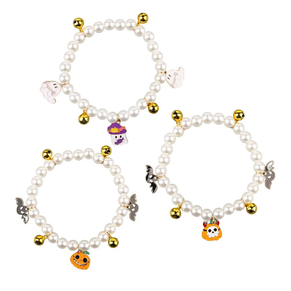 Three pet necklaces with pearl decoration and bells for cats and dogs
