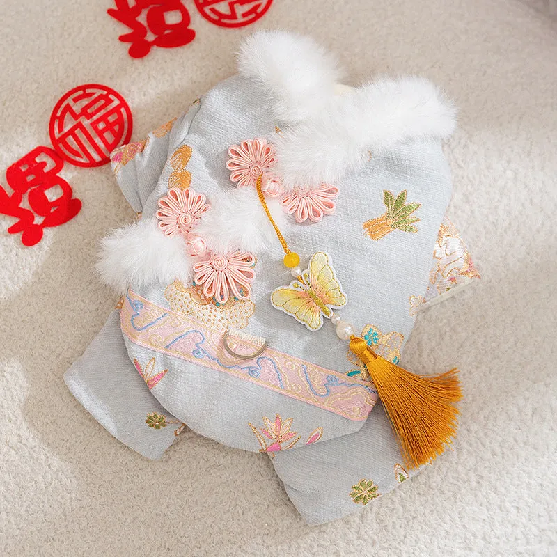 Red embroidered Tang suit for small dog with faux fur trim and tassels