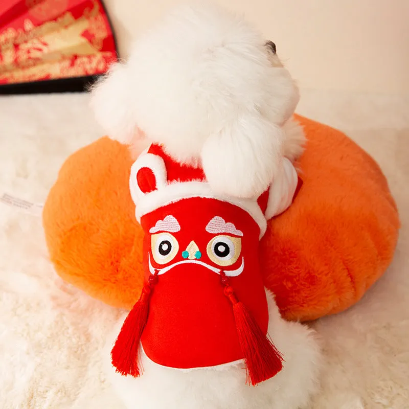 Red lion dance pet costume with embroidery and tassels on a dog