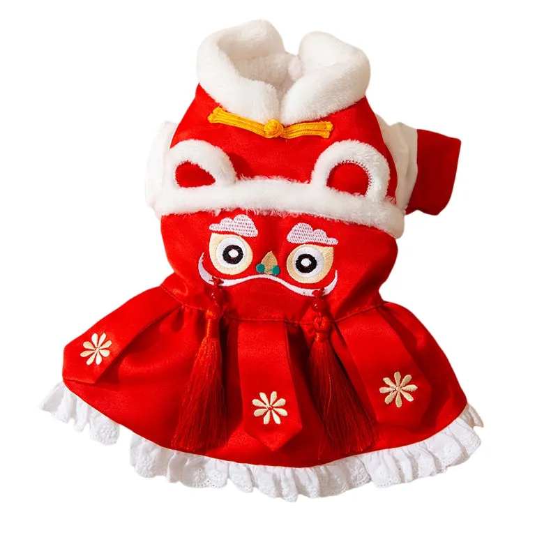 Red lion dance pet costume with embroidery and tassels on a dog
