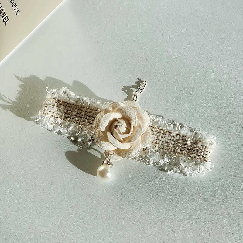 Magnolia flower scented pet collar accessory with chain in creamy white on a cat collar