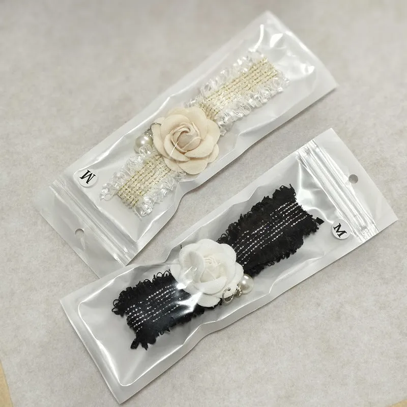 Magnolia flower scented pet collar accessory with chain in creamy white on a cat collar