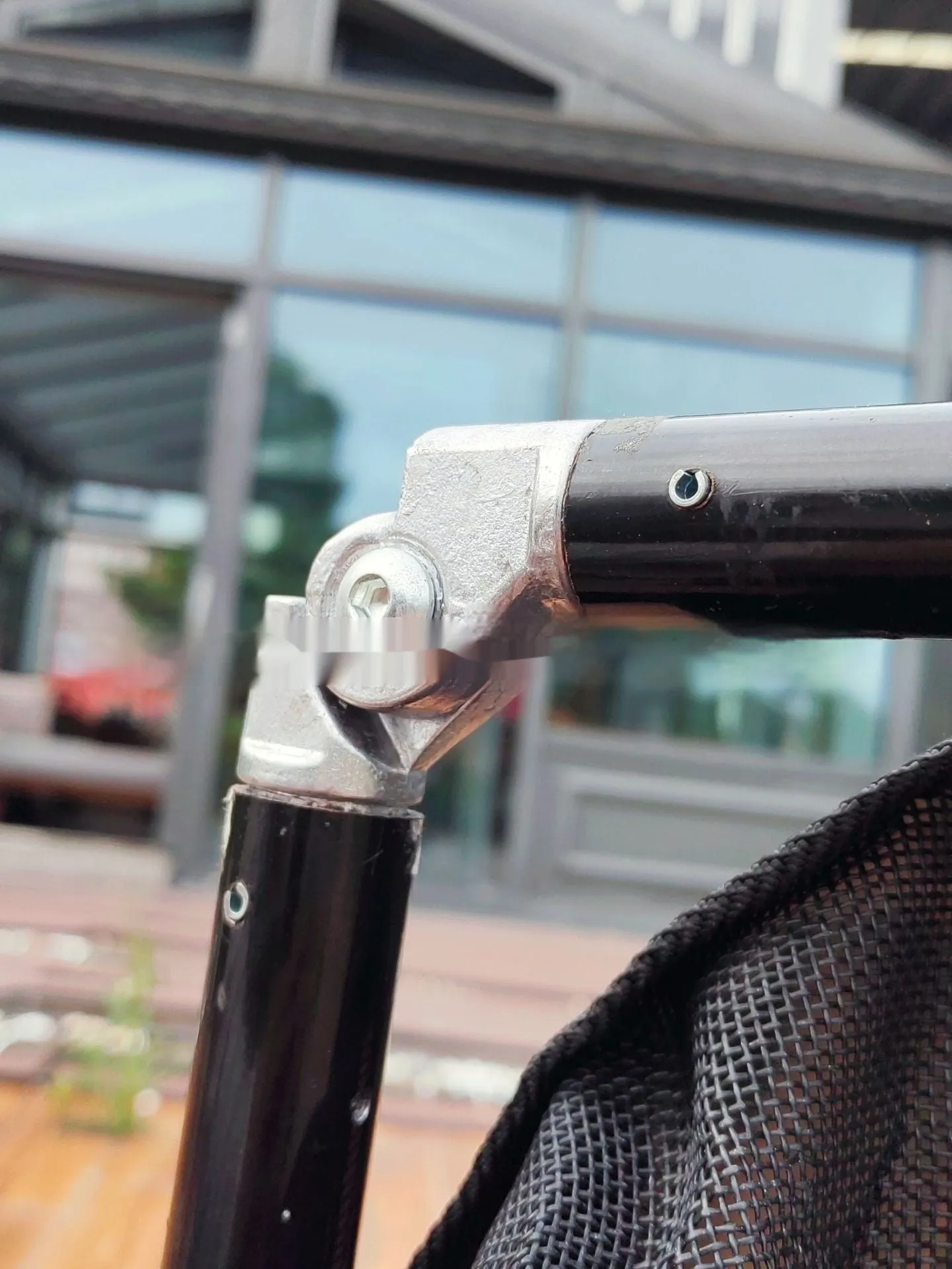 Large black aluminium alloy foldable pet stretcher for dog emergency transport.