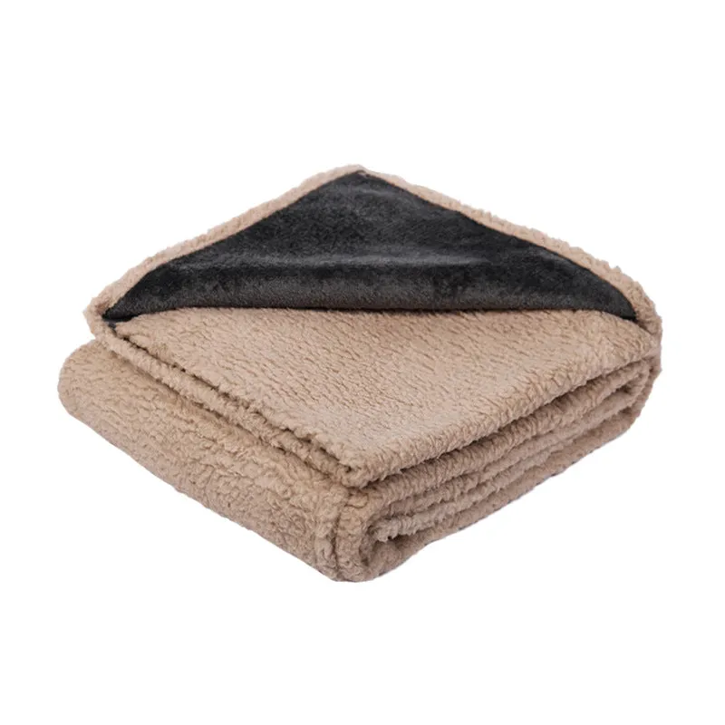 Flannel fleece composite thickened waterproof pet pad in blue gray, on a dog bed, available in multiple sizes