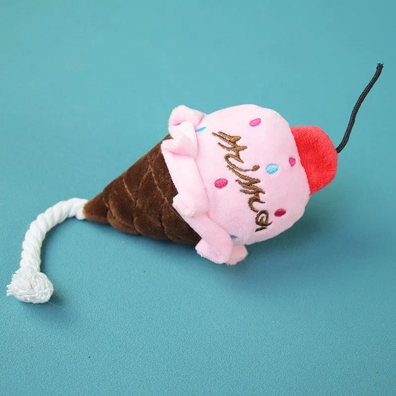 Dog plush chew toy in pink ice cream colour with soft fabric for interactive play