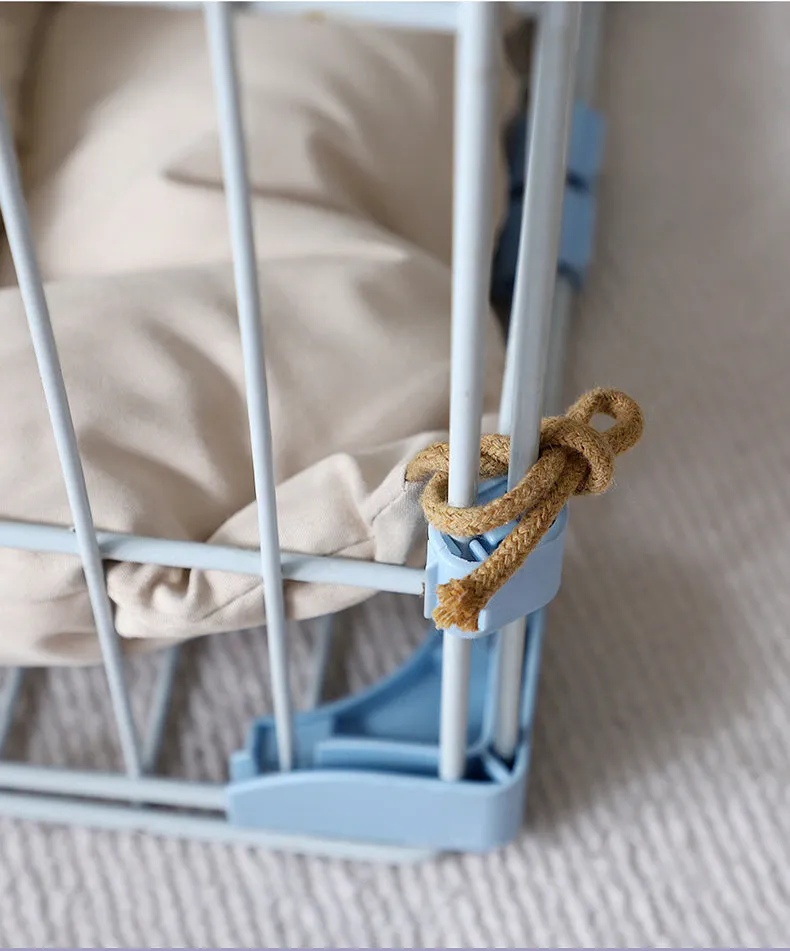 Beige tied cage cushion for small dog in crate showing secure attachment and warm bedding platform.