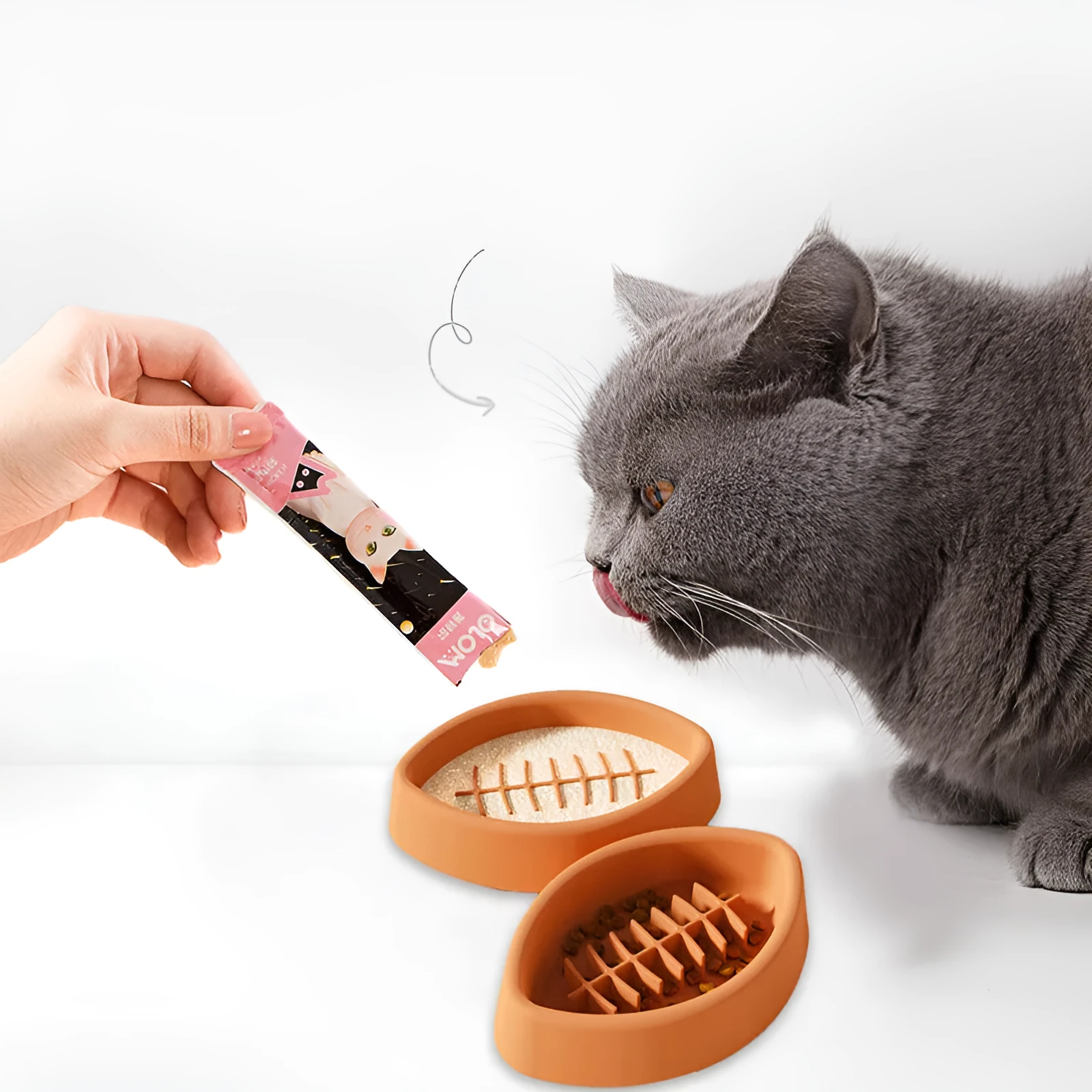 Silicone slow feed pet bowl with suction cup base in blue, grey, orange and red colour options
