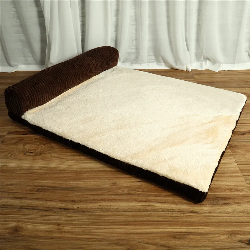 Corduroy dog sofa bed with bolster sides on a wooden floor, showing grey colour option in large size.