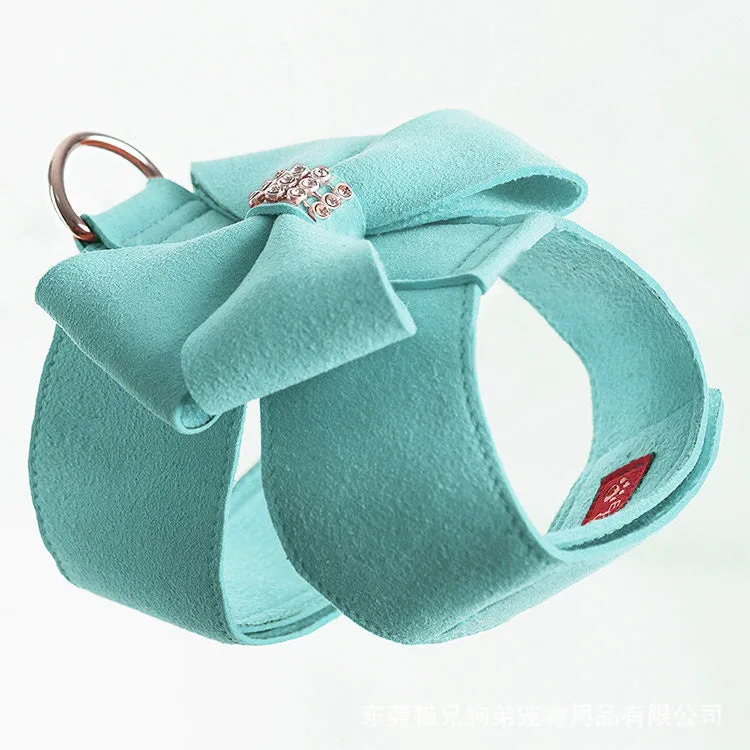 Pink microfiber dog chest strap with a bowknot, showing the harness design.