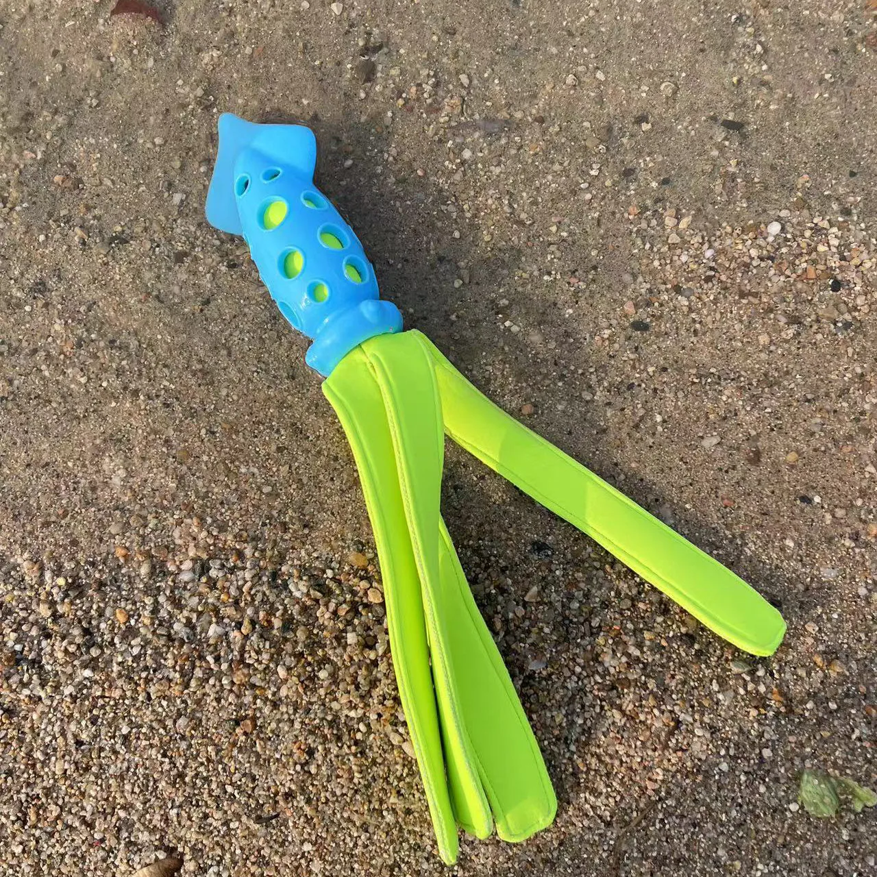 Blue cuttlefish-shaped dog chew toy with textured surface and squeaker for teeth cleaning