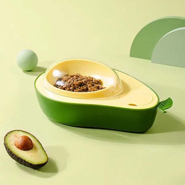 Green avocado-shaped pet feeder with automatic water bottle and separate food bowl