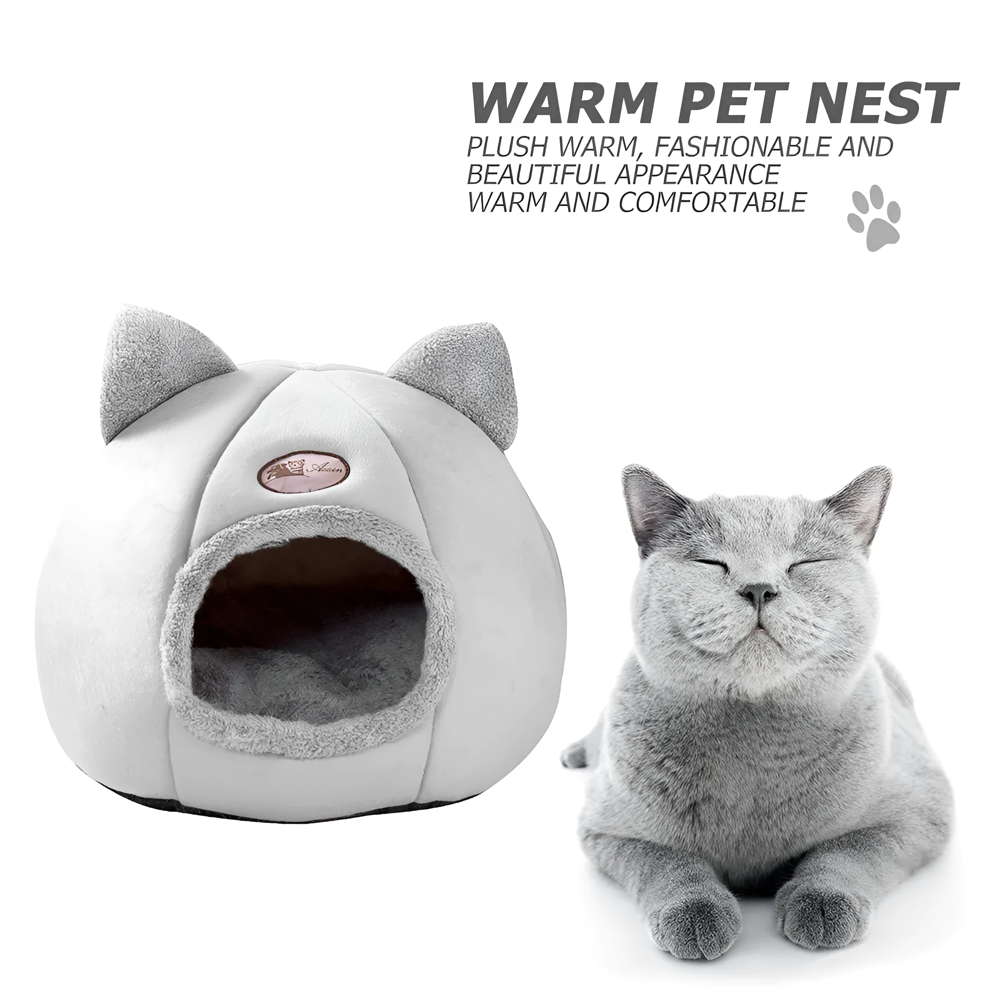 A large fully enclosed sofa-shaped cat winter house with a removable fleece cushion inside, shown in a home setting.