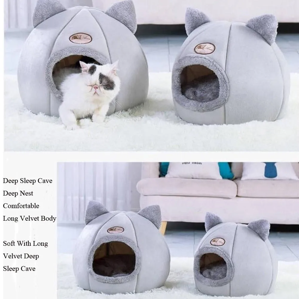 A large fully enclosed sofa-shaped cat winter house with a removable fleece cushion inside, shown in a home setting.
