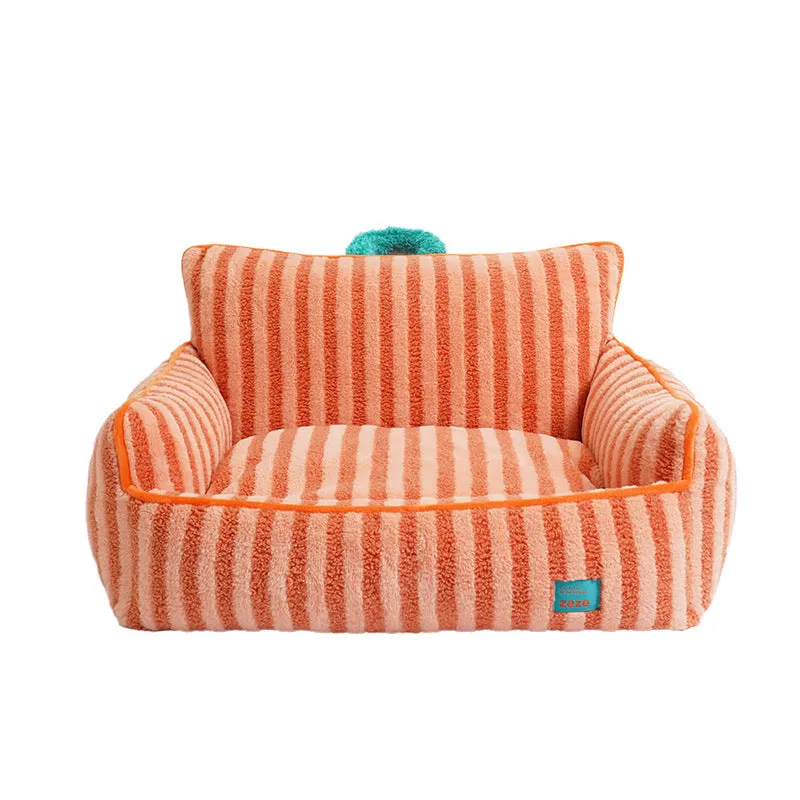 Striped orange plush fabric pet bed with a removable cover, shown in a home setting.