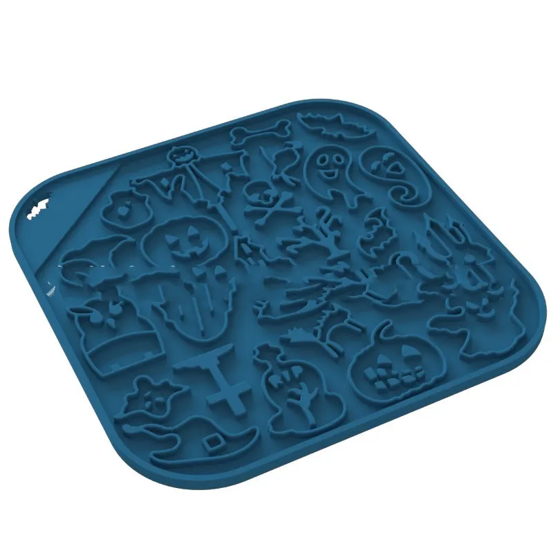Silicone slow feeder dog bowl with anti-tumble base in Halloween colour theme on a kitchen floor