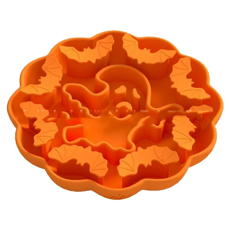 Silicone slow feeder dog bowl with anti-tumble base in Halloween colour theme on a kitchen floor