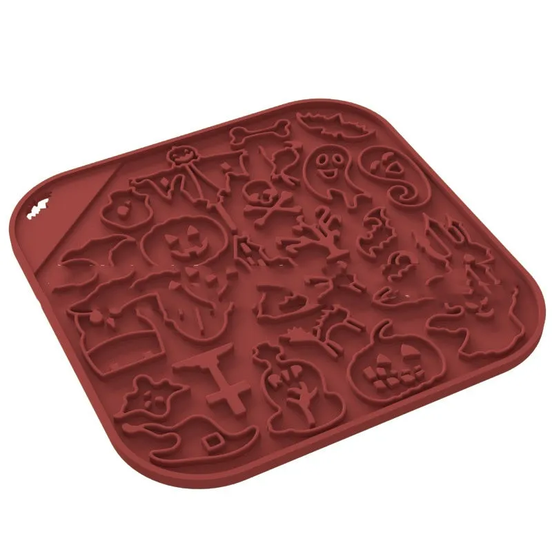Silicone slow feeder dog bowl with anti-tumble base in Halloween colour theme on a kitchen floor