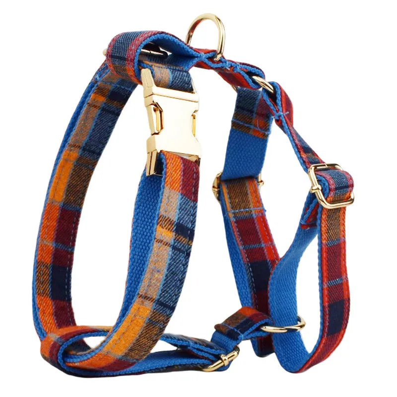 Gentleman-style dog collar, leash, bow, and vest four-piece cloth pet accessory set laid out flat.