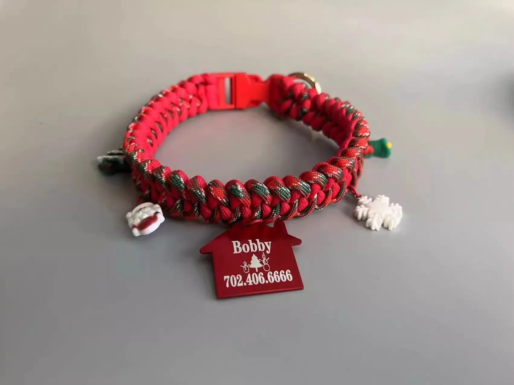 Green and red dog leash with metal P-chain, rope handle, and release buckle options