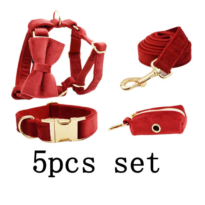 Cloth dog collar set with matching leash, vest, bow, and decorative flower accessories