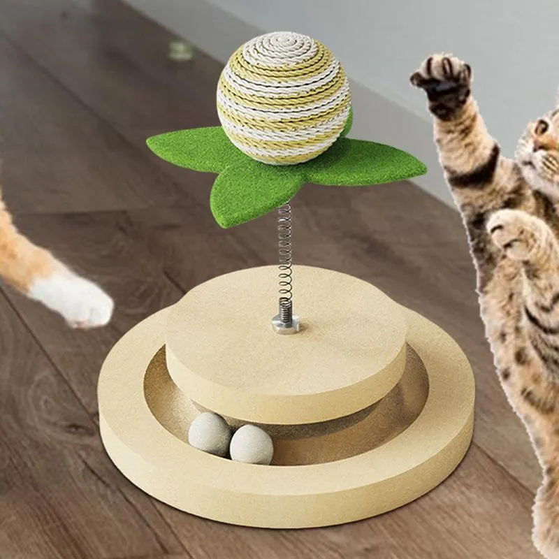 Green sisal cat toy with rotating ball track system for indoor feline play