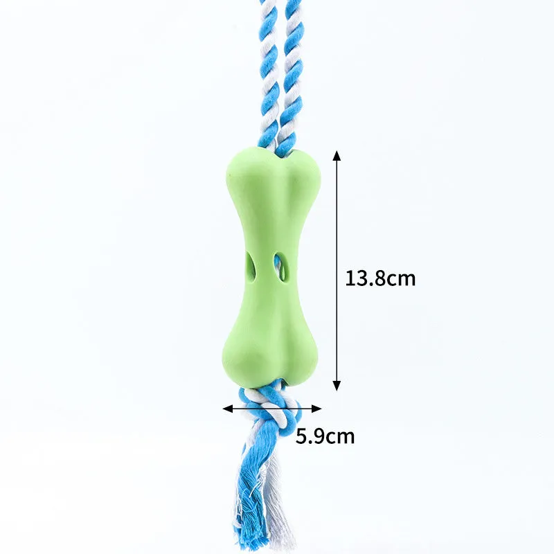 Green porous leaking bone dog toy with rope knot construction for chewing and treat stuffing