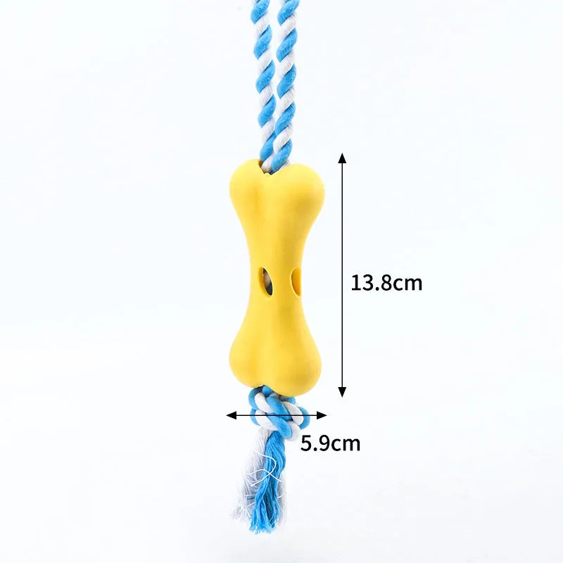 Green porous leaking bone dog toy with rope knot construction for chewing and treat stuffing