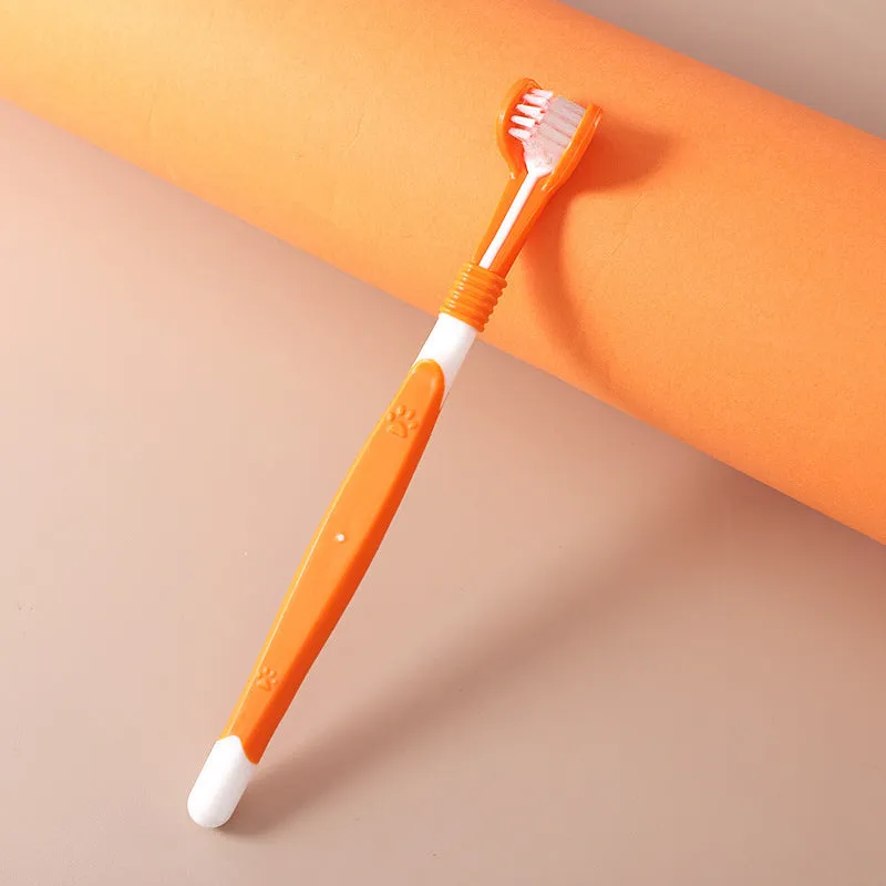 Pet toothbrush with plastic handle and nylon bristles in sealed packaging for dog and cat dental care