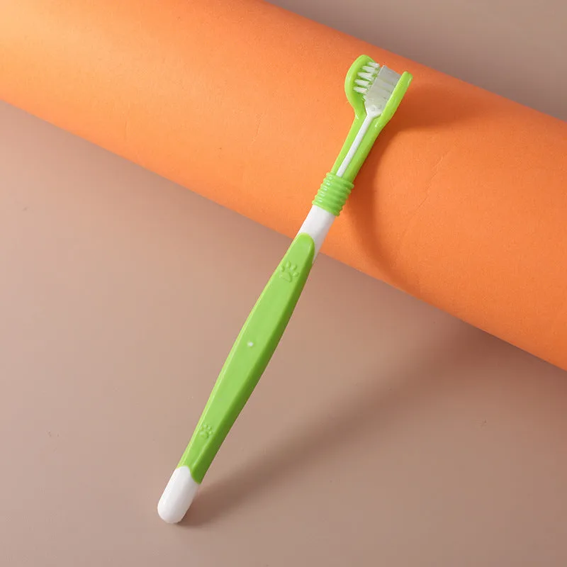 Pet toothbrush with plastic handle and nylon bristles in sealed packaging for dog and cat dental care