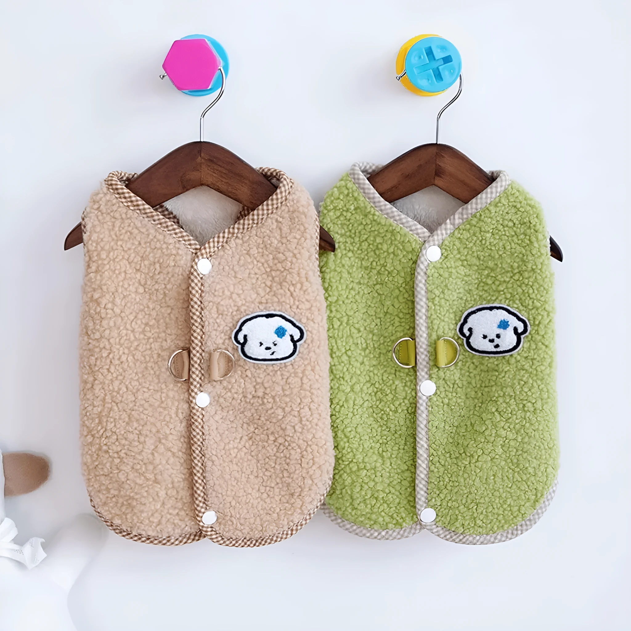 Green coral fleece dog sweatshirt vest with a leash ring on a small dog.