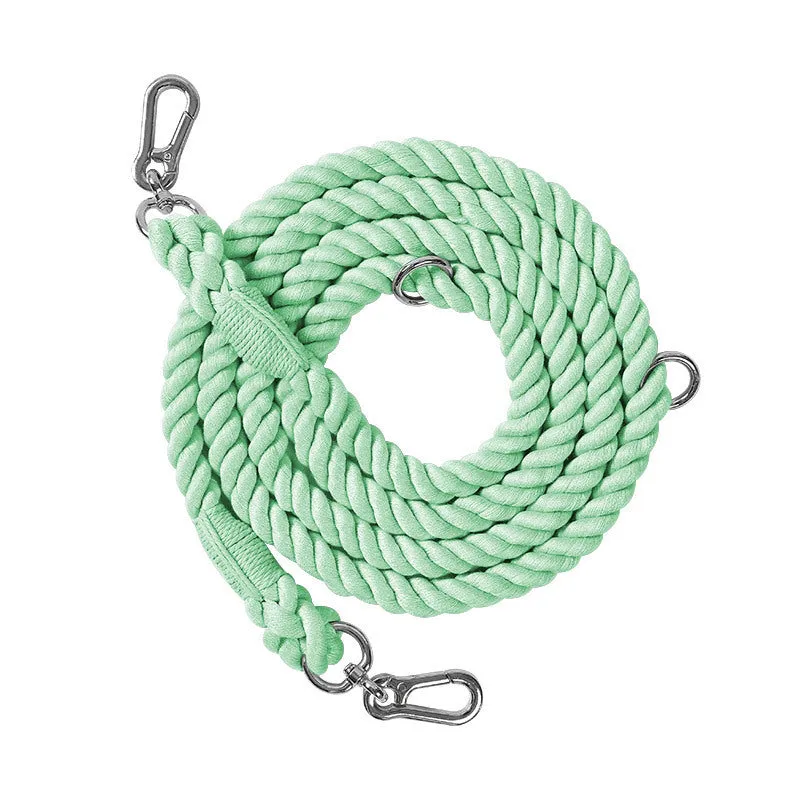 Woven rainbow pattern double-headed dog leash with metal fittings shown alongside mint green and blue purple colour options