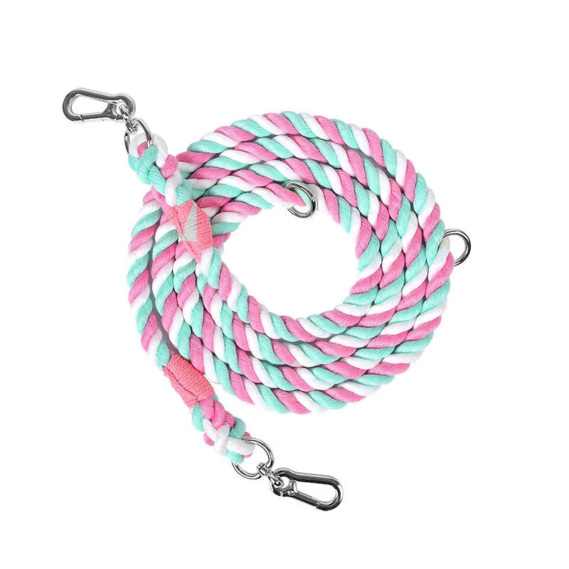 Woven rainbow pattern double-headed dog leash with metal fittings shown alongside mint green and blue purple colour options