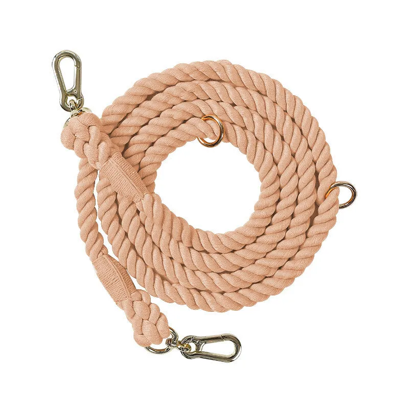 Woven rainbow pattern double-headed dog leash with metal fittings shown alongside mint green and blue purple colour options