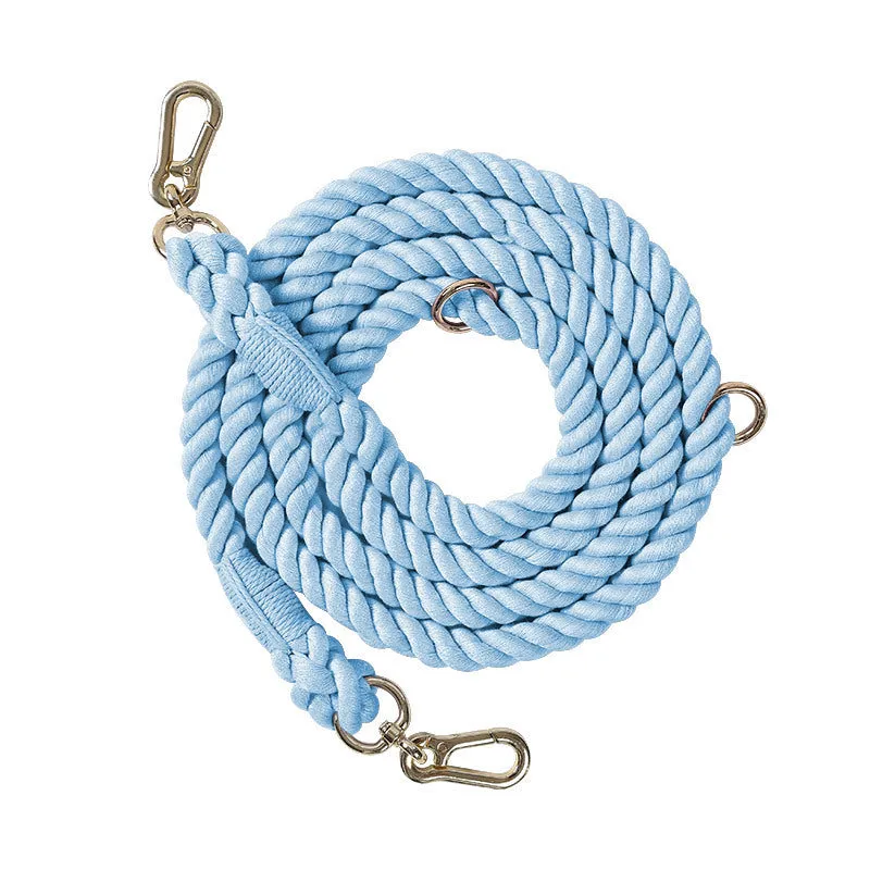 Woven rainbow pattern double-headed dog leash with metal fittings shown alongside mint green and blue purple colour options