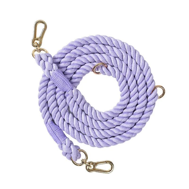 Woven rainbow pattern double-headed dog leash with metal fittings shown alongside mint green and blue purple colour options