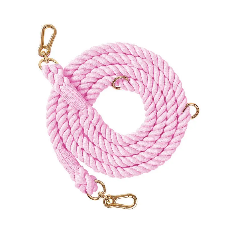 Woven rainbow pattern double-headed dog leash with metal fittings shown alongside mint green and blue purple colour options