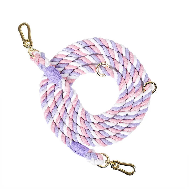 Woven rainbow pattern double-headed dog leash with metal fittings shown alongside mint green and blue purple colour options