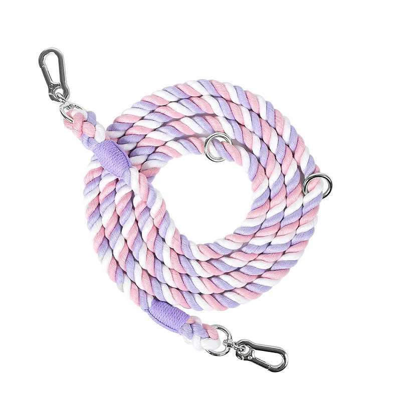 Woven rainbow pattern double-headed dog leash with metal fittings shown alongside mint green and blue purple colour options