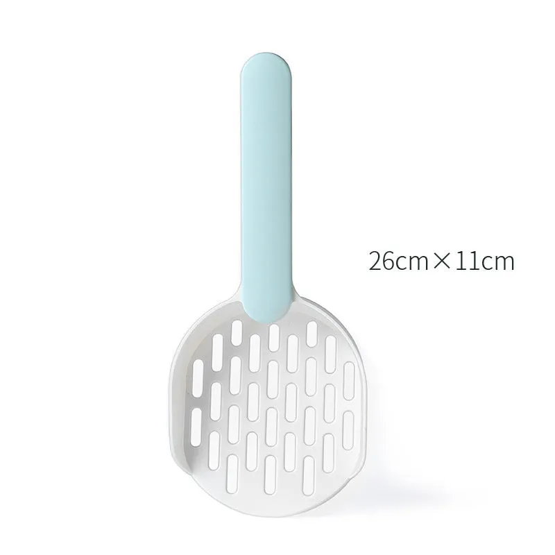 Blue plastic cat litter shovel scoop for cleaning litter boxes, shown next to a litter tray.