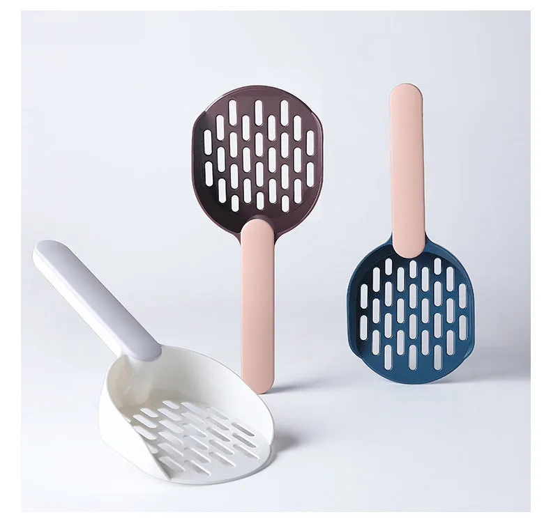 Blue plastic cat litter shovel scoop for cleaning litter boxes, shown next to a litter tray.